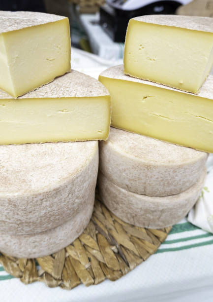 istock Pieces of cheese in a market 2116505711