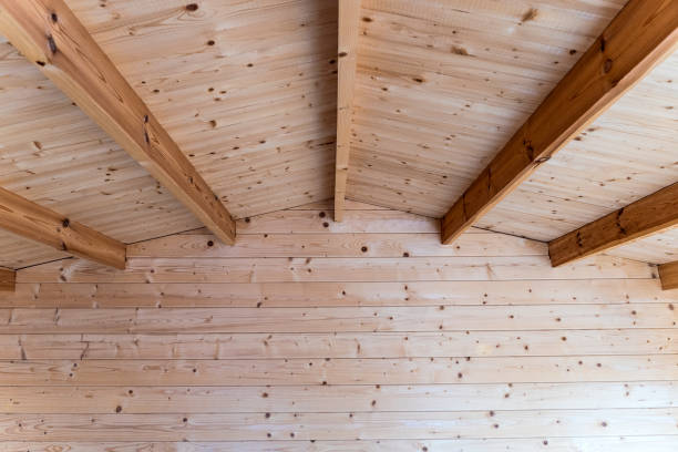 istock Wooden house structure made from new wooden beams 2116536617
