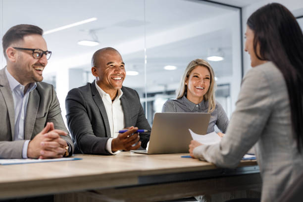 istock Happy human resource team having a job interview with their candidate. 2116539632