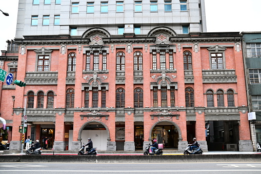 Taiwan - Jan 16, 2024: Starbucks Bao'an Store: 1920s Baroque red brick building in Taipei. First historic building Starbucks in the world. Blends modern cafe design with historic charm.
