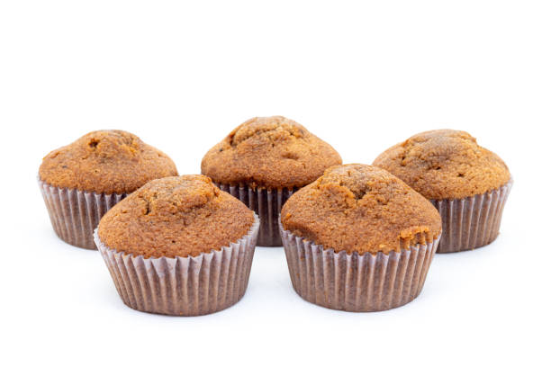 istock Fresh muffins chocolate cakes on white isolated background 2116549661