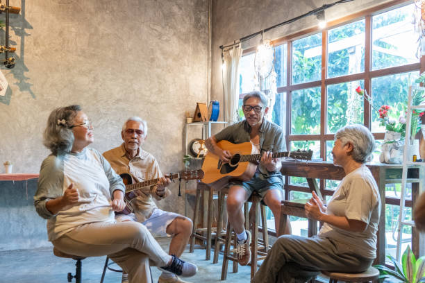 istock Group of Asian senior playing guitar 2116598248