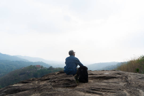 Asian senior men love to travel for new experiences