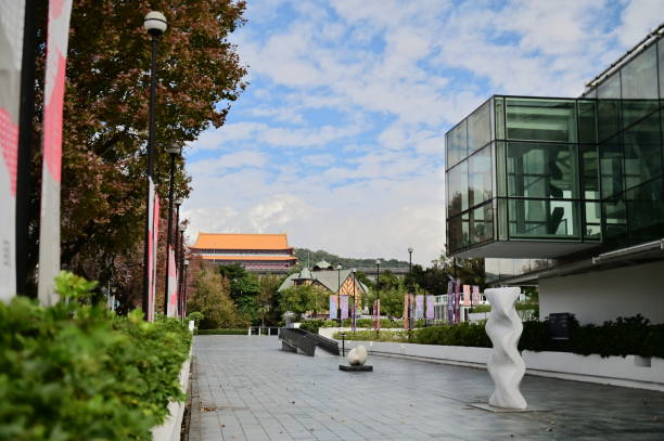 Taiwan - Jan 19, 2024: The close-up captures Taipei Fine Arts Museum's outdoor plaza in Zhongshan District, showcasing Maison ACME beside it and the iconic Grand Hotel in the distance.