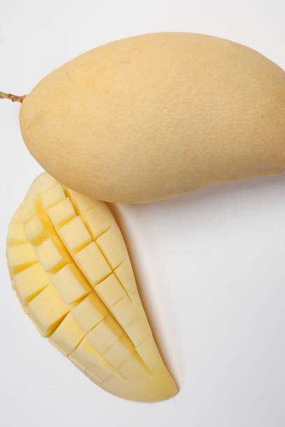 istock Yellow mango tropical fruit whole sliced cube diced half on white background 2116685559
