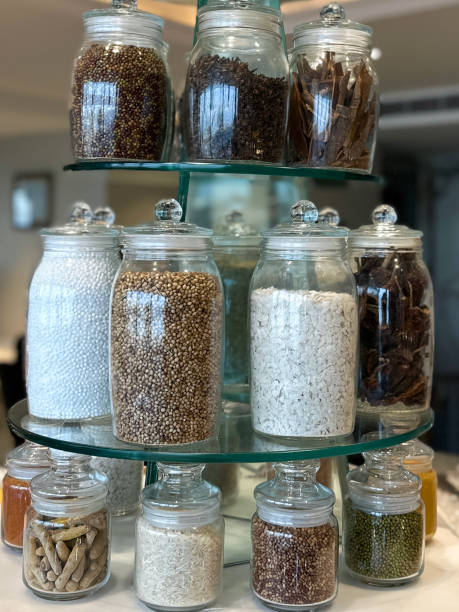 istock Image of organized kitchen pantry/ glass jars with beans, chilies, lentils, and split peas 2116702158