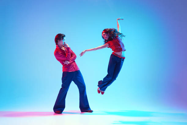 A conceptual image of a woman floating in space toward a bright light.