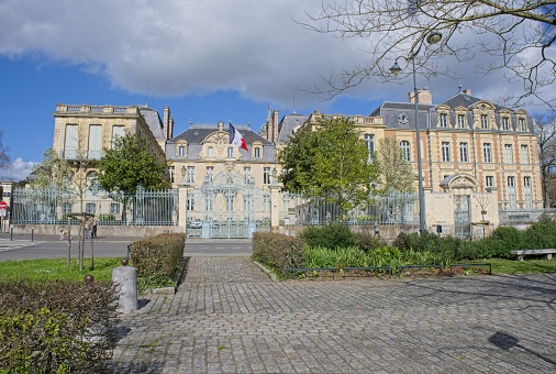 Rennes, France - Mar 24, 2024: Palace of the region of Rennes. People walking in Rennes on sunday. Streets and buildings. Lifestyle in the urban area. Sunny spring day. Selective focus