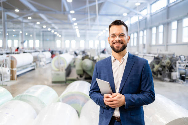 Businessman running production factory.