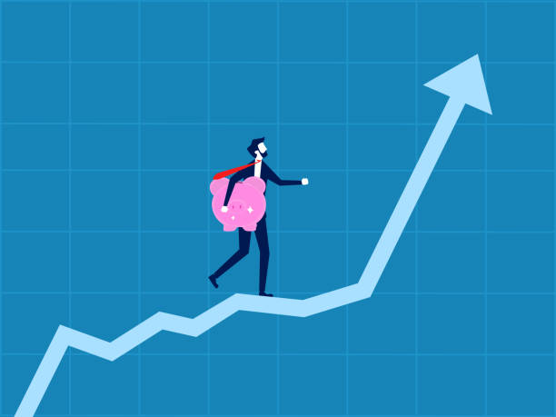istock Financial planning. Businessman holding a piggy bank walking on a rising graph 2116790754