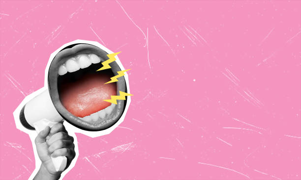 istock A human hand with a megaphone and a female open mouth on a pink background. 2116835368