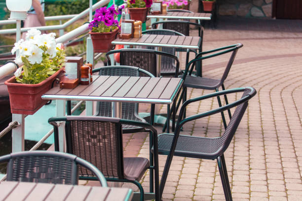 istock Tables with chairs in a cafe in nature 2116998111