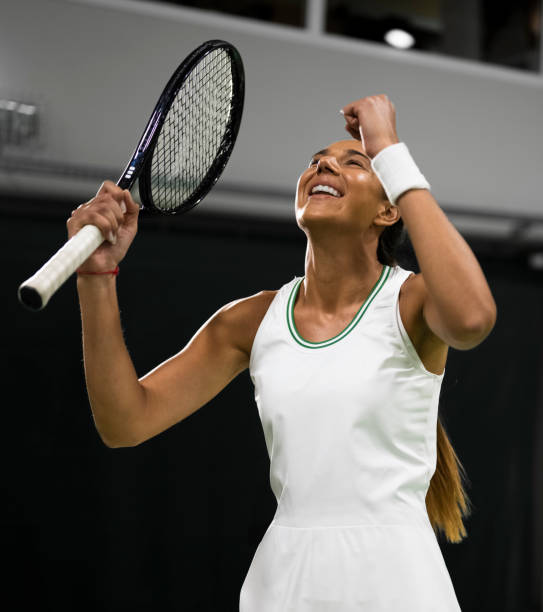 istock Tennis player cheering in court 2117001255