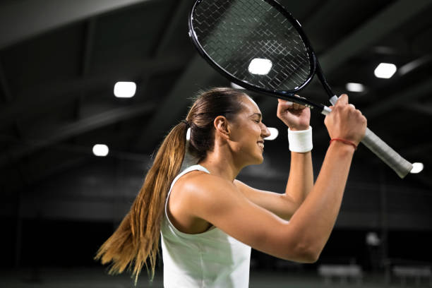 istock Tennis player cheering in court 2117002837