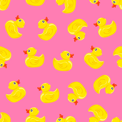 Yellow rubber duck on pink background.  Seamless pattern. Texture for fabric, wrapping, wallpaper. Decorative print.Vector illustration