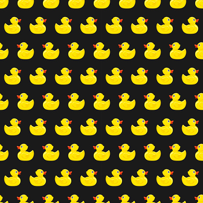 Yellow rubber ducks on black background.  Seamless pattern. Texture for fabric, wrapping, wallpaper. Decorative print.Vector illustration