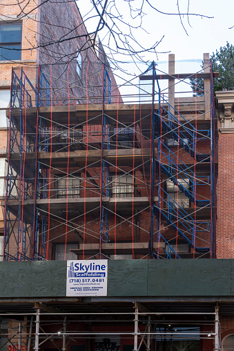 Greenwich village, Manhattan, New York, USA - March, 2024. Scaffolding on an apartment block in Greenwich Village