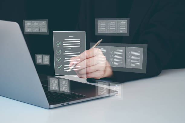 istock Document management and checklist concept, Businesswomen show e-document on smartphone online management on virtual screen automation to efficiently document paperless operation technology 2117035013