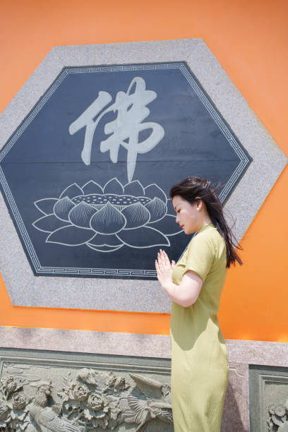 istock young buddhist woman 2117051644