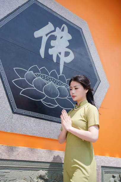 istock young buddhist woman 2117051646