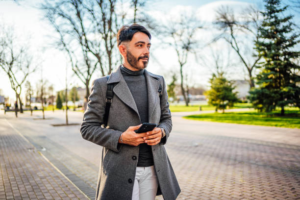 istock Man walking in the city 2117077157