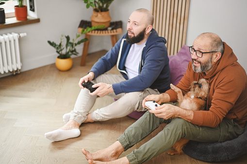two friends playing video games