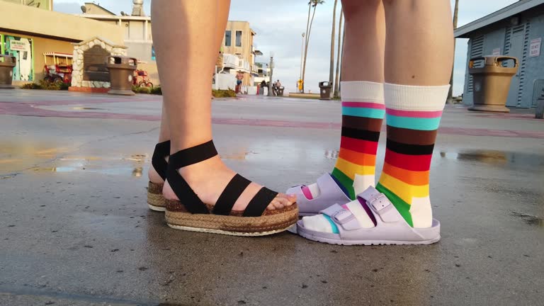 Person wearing rainbow socks during the Pride Month