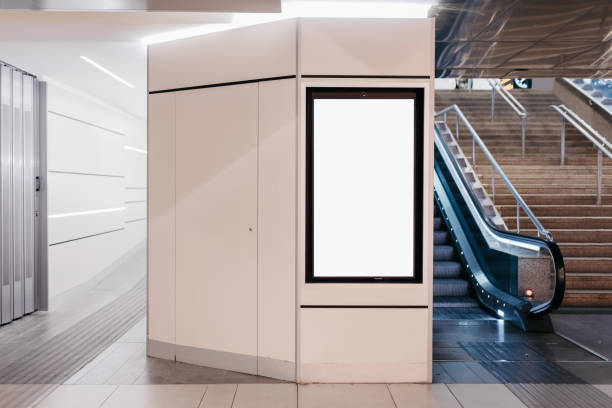 istock White vertical advertising board display in underground train station 2117114548