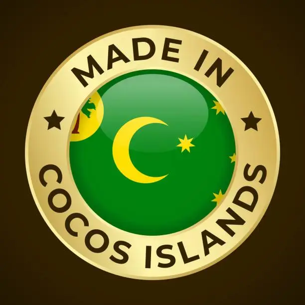 Vector illustration of Made in Cocos Islands - Vector Graphics. Round Golden Label Badge Emblem with Flag of Cocos Islands and Text Made in Cocos Islands. Isolated on Dark Background