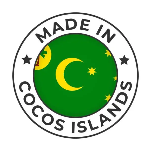 Vector illustration of Made in Cocos Islands - Vector Graphics. Round Simple Label Badge Emblem with Flag of Cocos Islands and Text Made in Cocos Islands. Isolated on White Background