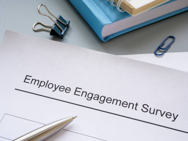 istock Employee engagement survey, notepads and pen. 2117133373