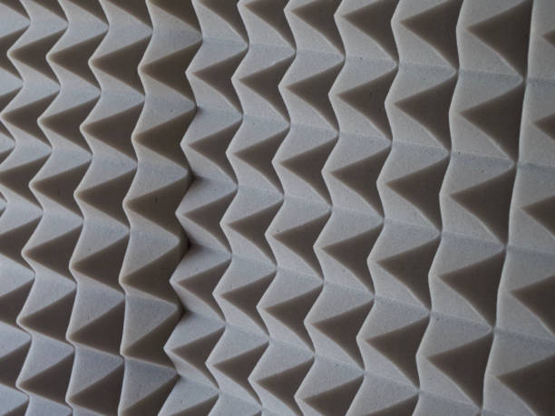 istock Grey acoustic foam rubber. Soundproof pyramids, full frame. 2117146616