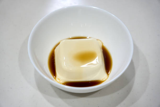 istock Tofu and soy sauce in a cup 2117155107