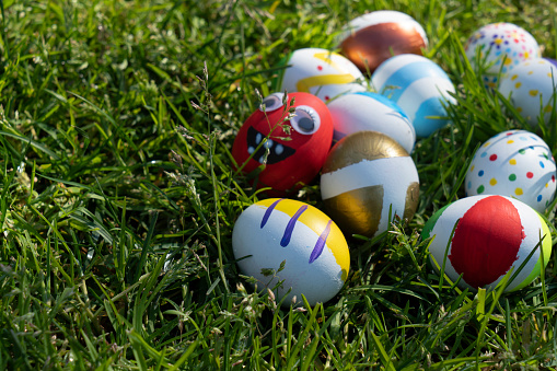 Close-up Colorful Easter eggs on green grass