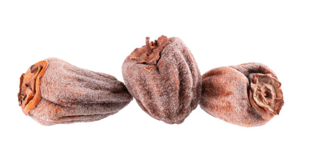 istock Dried persimmon isolated on white background. Dried fruit snack. 2117193998