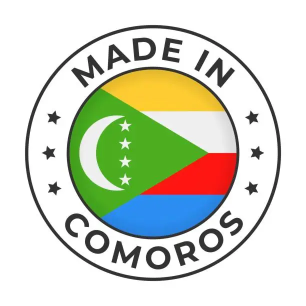 Vector illustration of Made in Comoros - Vector Graphics. Round Simple Label Badge Emblem with Flag of Comoros and Text Made in Comoros. Isolated on White Background