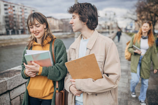 istock Young student couple  in city 2117246492
