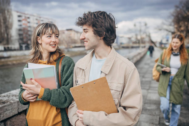 istock Young students couple  in city 2117248651