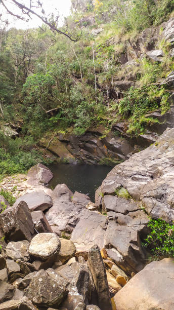 istock Large waterfall over 100 meters high. 2117254018