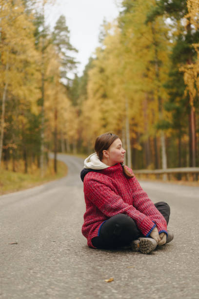 beautiful couple walking in the autumn forest, portraits on the background of beautiful nature