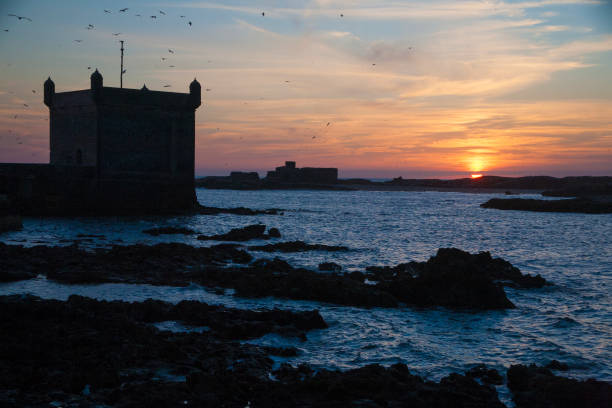 Sunset over the old port at Essaouira, Morocco.