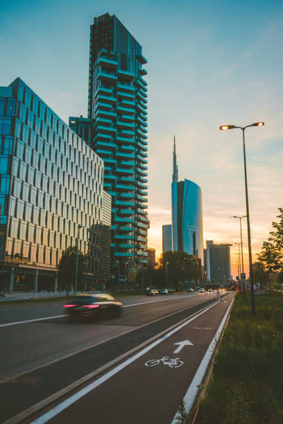 One of the streets near Gae Aulenti with some skyscrapers at sunset, Milan, Lombardia, Italy