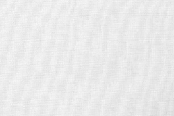 istock White cotton fabric texture background, seamless pattern of natural textile. 2117301540