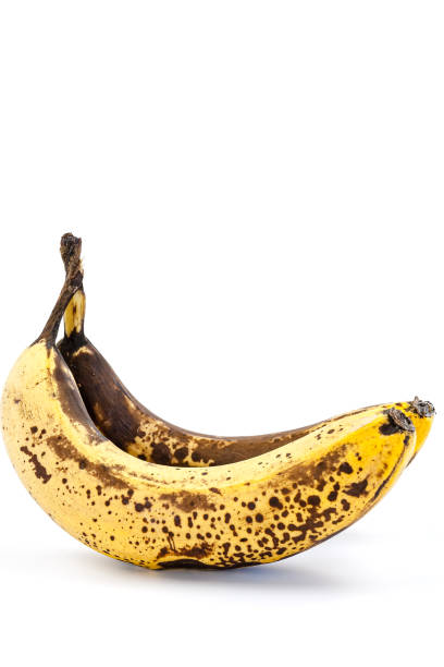 istock A ripe banana with brown spots 2117313916