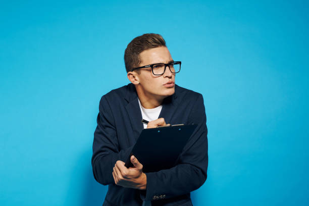 istock business man with documents in hands and business work lifestyle studio 2117375633