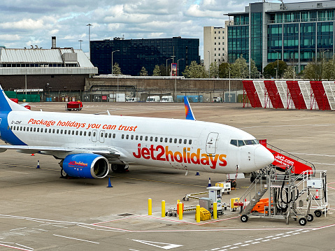 Birmingham, Worcestershire, UK - 15 March 2024: Boeing 737 jet operated by the Jet2 package holiday company at Birmingham airport.