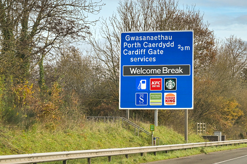 Cardiff, Wales, UK - 29 November 2023: Sign for the services on the M4 motorway near Cardiff in south Wales