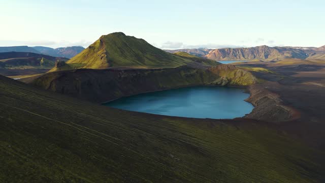 Aerial drone view of Blahylur Crater during sunrise in the highlands of Iceland