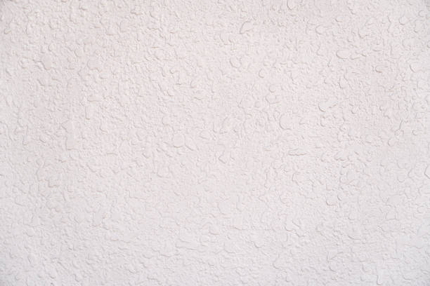 Loft-style plaster walls, gray, white, empty space used as wallpaper. Popular in home design or interior design. with copy spaces.