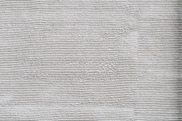 Loft-style plaster walls, gray, white, empty space used as wallpaper. Popular in home design or interior design. with copy spaces.
